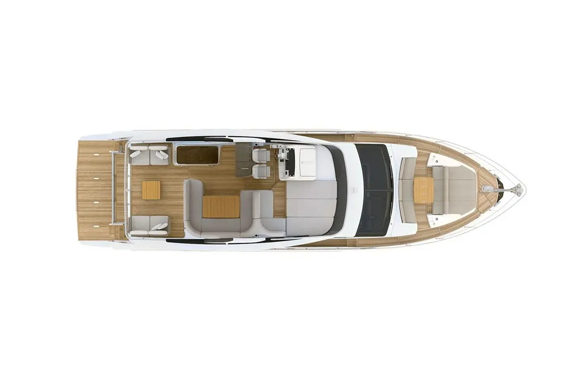 Bird's-eye view of a luxury motorboat featuring seating areas, a dining table, and a helm station, set on a wooden deck.